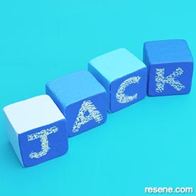 Blackboard blocks with letters on them