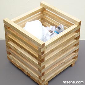 Create this sturdy waste paper boin