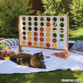 Build a giant four in a row game for your garden