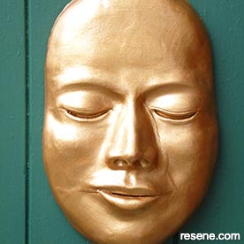 Gold face plaque