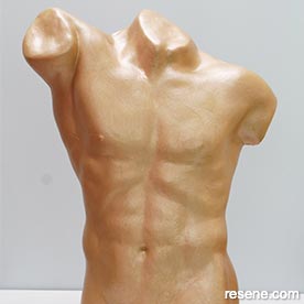 Paint a gold torso