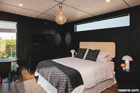 Small room painted with dark colours