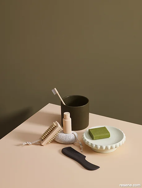 Interior accessories painted in peach tones and earthy greens