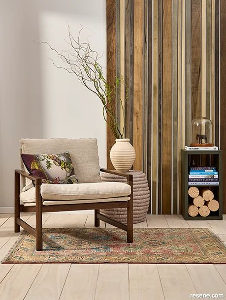Wood-stained feature wall adds colour and texture to this sitting room