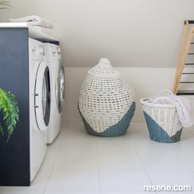 Paint cane and wicker laundry basket
