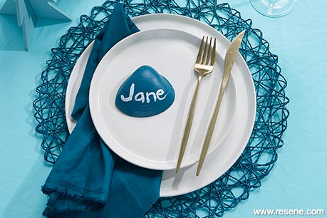 A Christmas shell name place setting