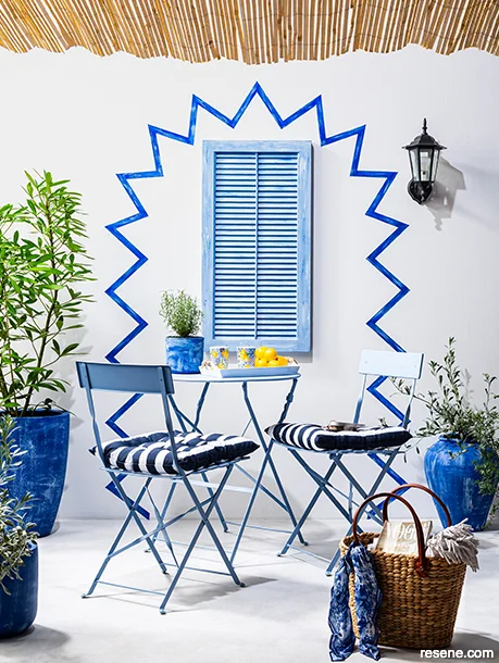 A Mediterranean dining area - blue hues inspired by the sea and sky