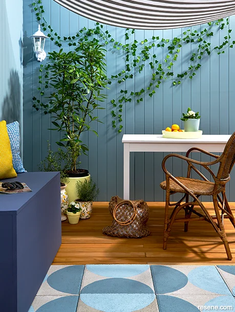 A Hamptons style patio painted with oceanic blues