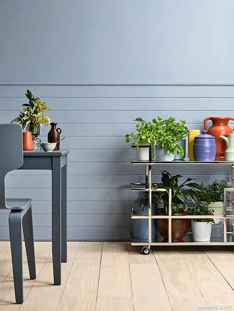 A sophisticated dining room painted in Resene Neutral Bay - greyish blue