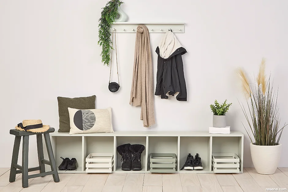 A sophisticated entryway painted with warm neutrals