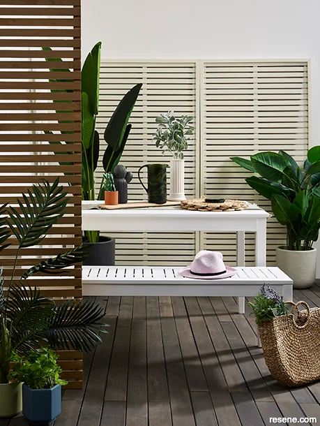 A tropical inspired outdoor dining space