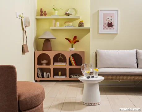 An uplifting lounge painted in summer inspired hues