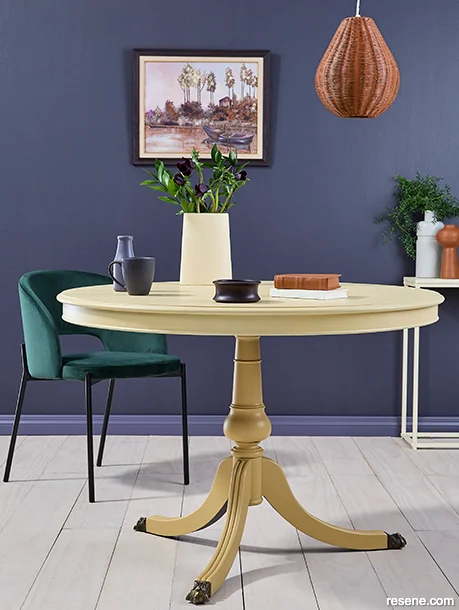 A vibrant dining space with layered light and dark hues