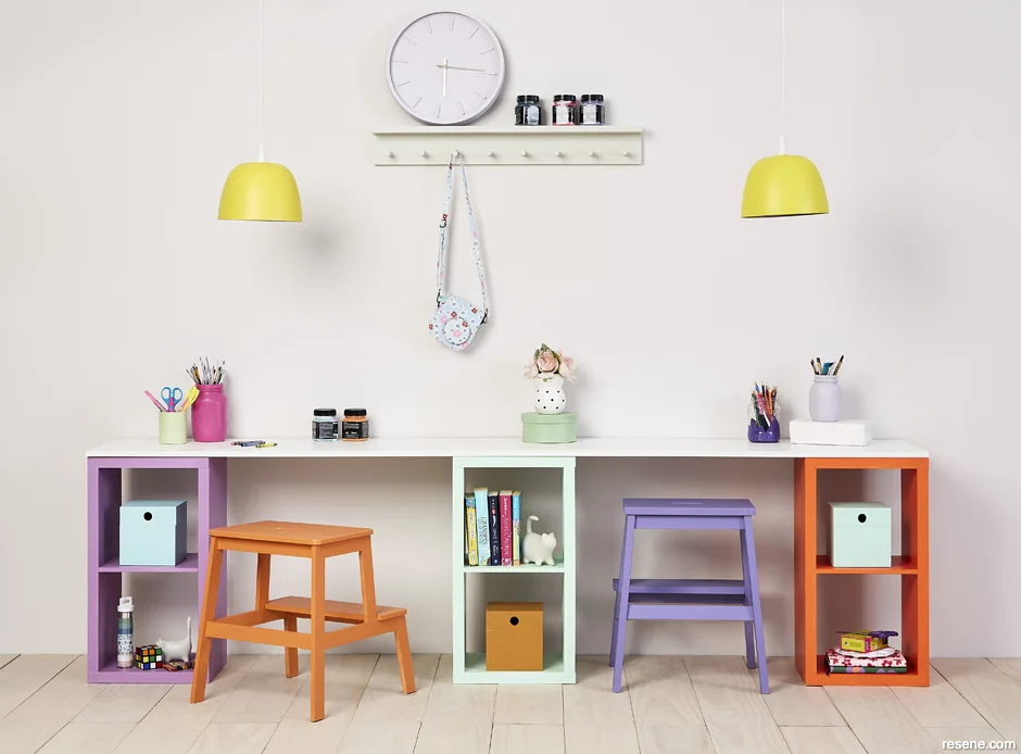 A vibrant kids craft room painted in a 70s inspired palette