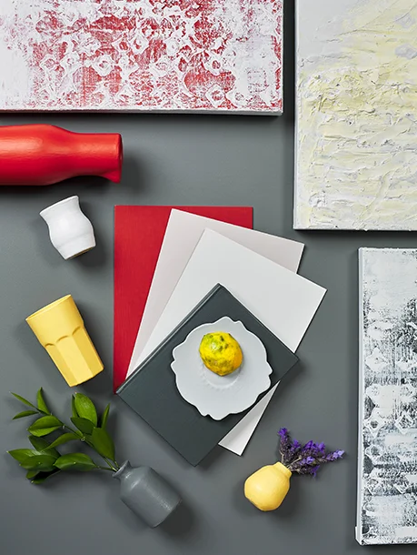 A moodboard of vibrant warm hues - mustard yellows and reds