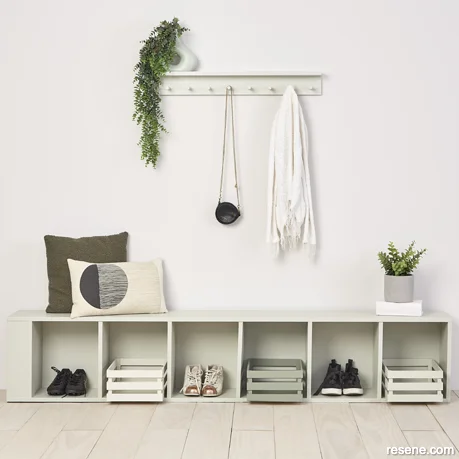 A home entryway painted with warm neutrals