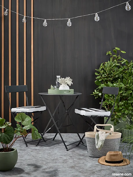 A wood-stained moody outdoor living space