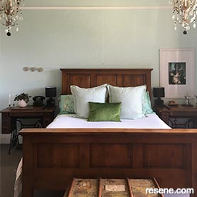 White and green master bedroom