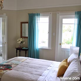 Light brown and white bedroom
