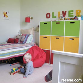 A brightly painted cabinet in a child's room