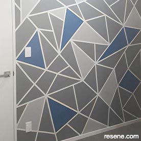 Painted wall patterns in bedroom