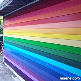 A rainbow coloured garage door