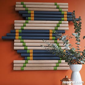 Make a wooden dowel wall hanging