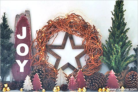 A handpainted rustic Christmas sign