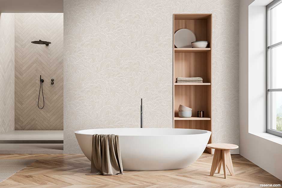 A neutral bathroom with a twist - stylised wave design wallpaper