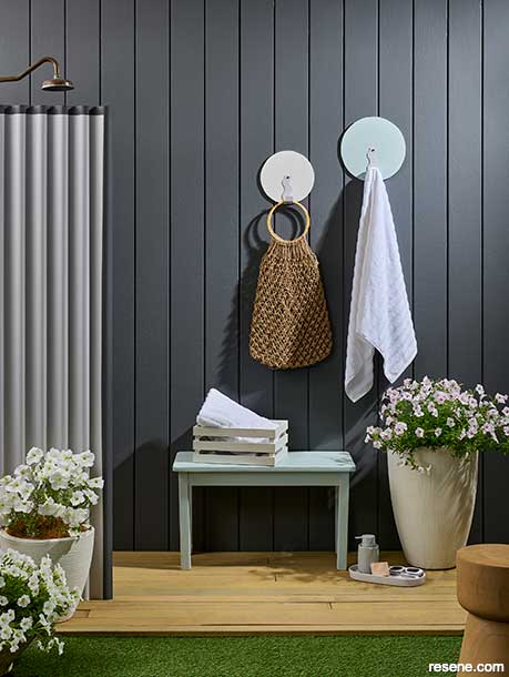 An outdoor shower that luxurious and beachy