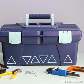 Paint your toolbox with a triangle pattern