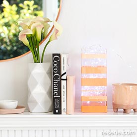 Paint stripes on a glass vase
