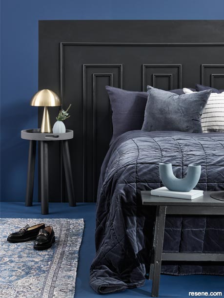 A deep and dramatic bedroom