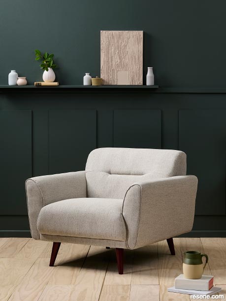 A rich forest green lounge in Resene Jurassic