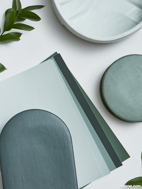 A moodboard showcasing grounding greens