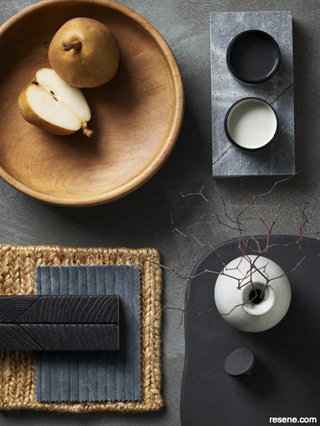 Winter-themed moodboard featuring moody paint hues and dark home accessories
