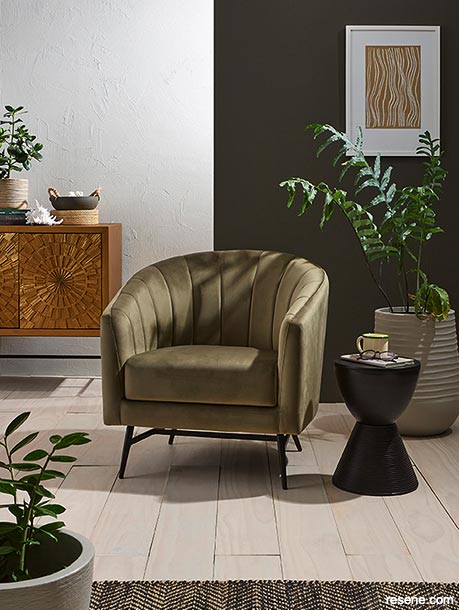 A cosy and comfortable room in shades of dark Resene greens and chocolate browns