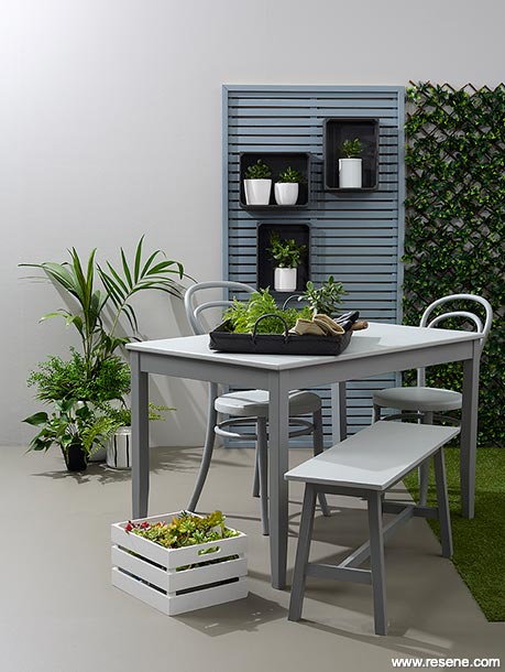 A modern patio that incorporates nature