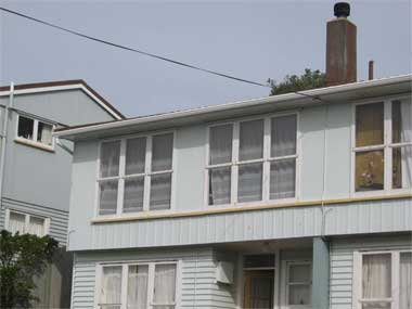 Asbestos containing roofing and cladding