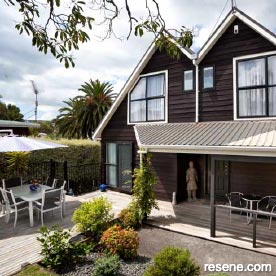 Timber cladding repainted in Resene Woodsman