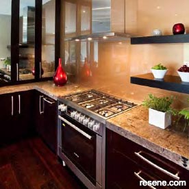 Gold coloured painted splashback