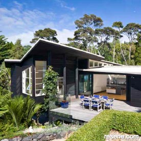 Dark home exterior woodstain