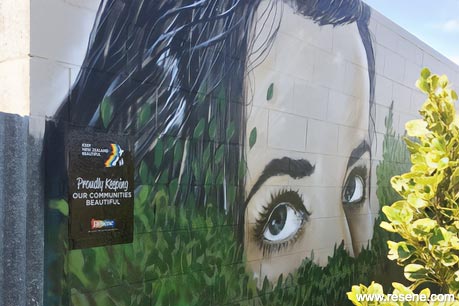 Painting NZ Beautiful mural