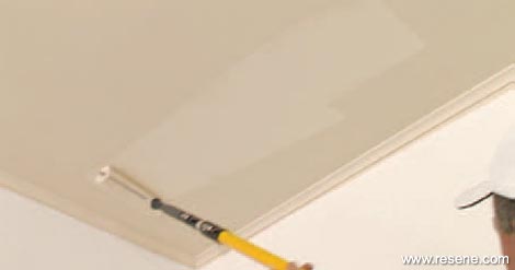 Applying the second coat of paint