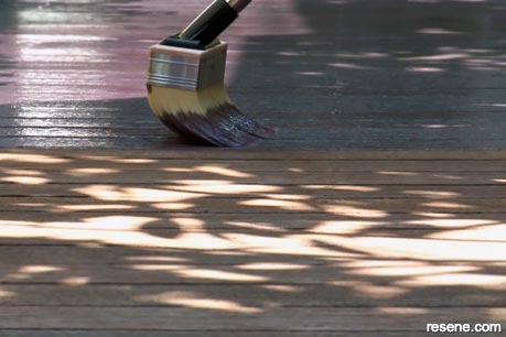 Brushing on Resene Timber Decking Oil Stain
