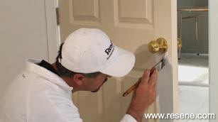 Painting around the door handle