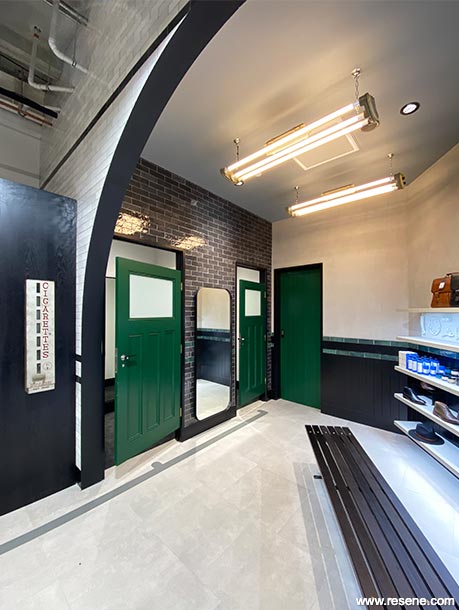 Green, black, and white store interior