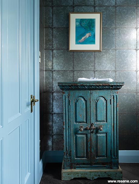 A grey and blue bathroom