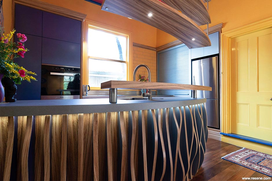 Bright yellow and dark blue kitchen