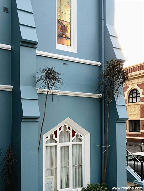 Blue and white apartment exterior